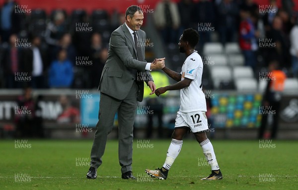 141017 - Swansea City v Huddersfield Town - Premier League - Paul Clement and Nathan Dyer of Swansea City at full time