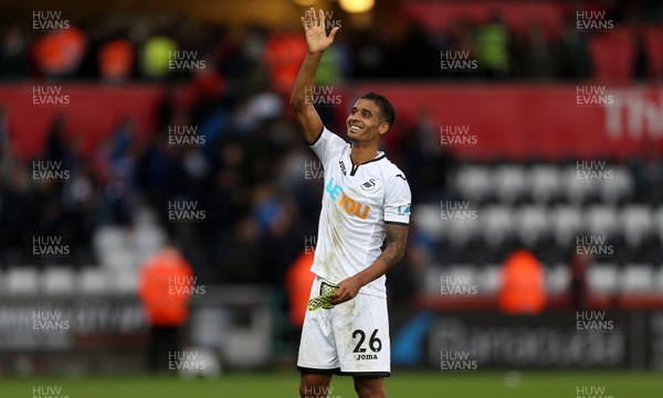 141017 - Swansea City v Huddersfield Town - Premier League - Kyle Naughton of Swansea City waves to the fans at full time