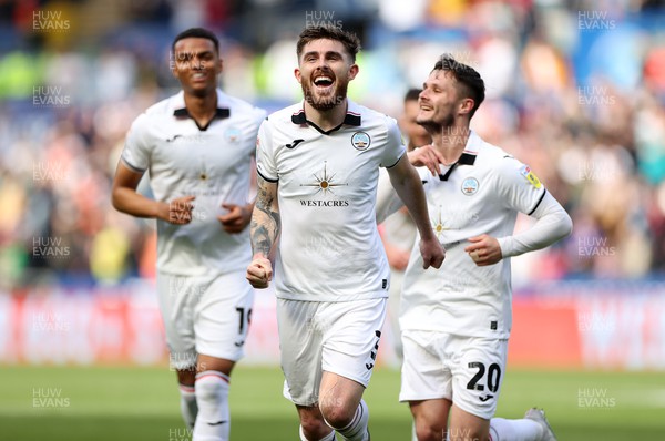 150423 - Swansea City v Huddersfield Town - SkyBet Championship - Ryan Manning of Swansea City celebrates scoring a goal with team mates