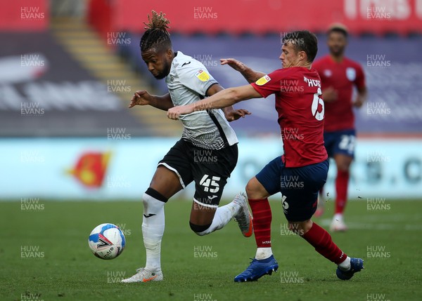 171020 - Swansea City v Huddersfield Town - SkyBet Championship - Kasey Palmer of Swansea City is tackled by Jonathan Hogg of Huddersfield Town