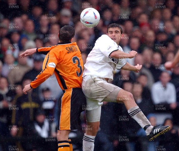 030503 - Swansea City v Hull City - Third Division - Swansea's James Thomas wins challenge against Sean Smith