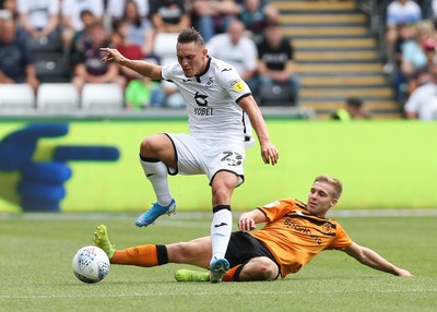 030819 - Swansea City v Hull City, Sky Bet Championship - Connor Roberts of Swansea City is challenged by Daniel Batty of Hull City