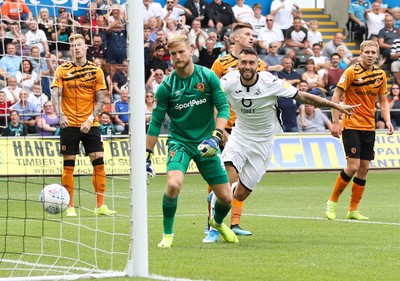 030819 - Swansea City v Hull City, Sky Bet Championship - Borja Baston of Swansea City heads the ball past Hull City goalkeeper George Long to score Swansea's first goal