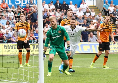 030819 - Swansea City v Hull City, Sky Bet Championship - Borja Baston of Swansea City heads the ball past Hull City goalkeeper George Long to score Swansea's first goal