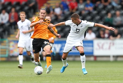 030819 - Swansea City v Hull City, Sky Bet Championship - Kristoffer Peterson of Swansea City is tackled by Jackson Irvine of Hull City