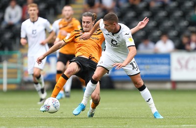 030819 - Swansea City v Hull City, Sky Bet Championship - Kristoffer Peterson of Swansea City is tackled by Jackson Irvine of Hull City