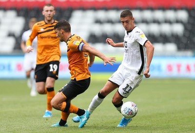 030819 - Swansea City v Hull City, Sky Bet Championship - Kristoffer Peterson of Swansea City gets past Eric Lichaj of Hull City