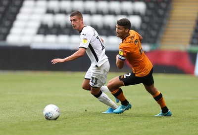 030819 - Swansea City v Hull City, Sky Bet Championship - Kristoffer Peterson of Swansea City gets past Eric Lichaj of Hull City