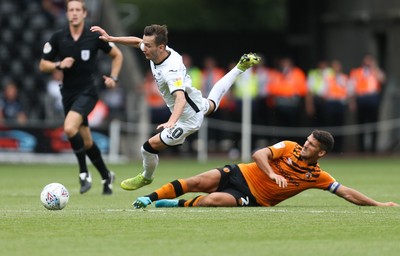 030819 - Swansea City v Hull City, Sky Bet Championship - Bersant Celina of Swansea City is brought down by Eric Lichaj of Hull City