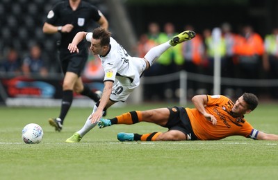 030819 - Swansea City v Hull City, Sky Bet Championship - Bersant Celina of Swansea City is brought down by Eric Lichaj of Hull City