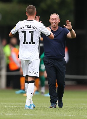 030819 - Swansea City v Hull City, Sky Bet Championship - Swansea City head coach Steve Cooper celebrates with Kristoffer Peterson of Swansea City at the end of the match