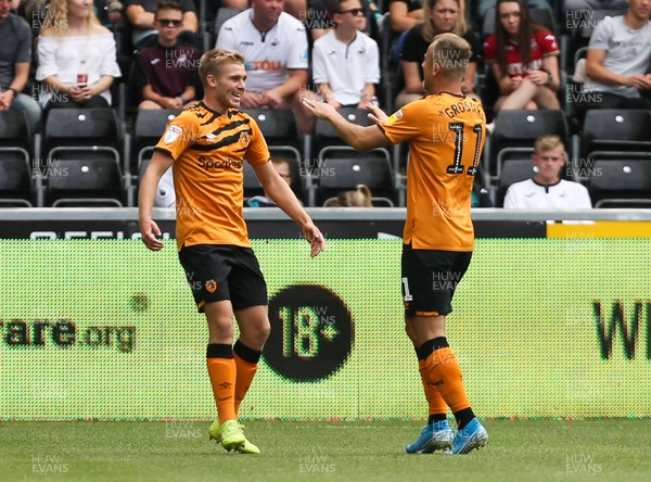 030819 - Swansea City v Hull City, Sky Bet Championship - Daniel Batty of Hull City and Kamil Grosicki of Hull City celebrate after scoring goal early in the match