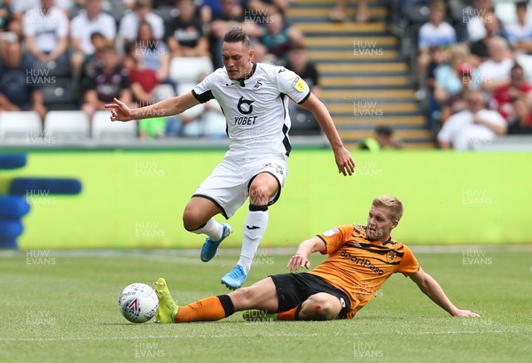030819 - Swansea City v Hull City, Sky Bet Championship - Connor Roberts of Swansea City is challenged by Daniel Batty of Hull City