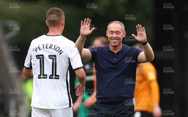 030819 - Swansea City v Hull City, Sky Bet Championship - Swansea City head coach Steve Cooper celebrates with Kristoffer Peterson of Swansea City at the end of the match