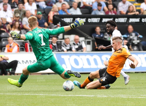 030819 - Swansea City v Hull City, Sky Bet Championship - Nathan Dyer of Swansea City sees Reece Burke of Hull City and Hull City goalkeeper George Long block his shot at goal