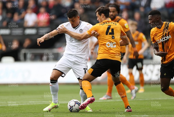 110921 - Swansea City v Hull City - SkyBet Championship - Joel Piroe of Swansea City is challenged by Jacob Greaves of Hull City
