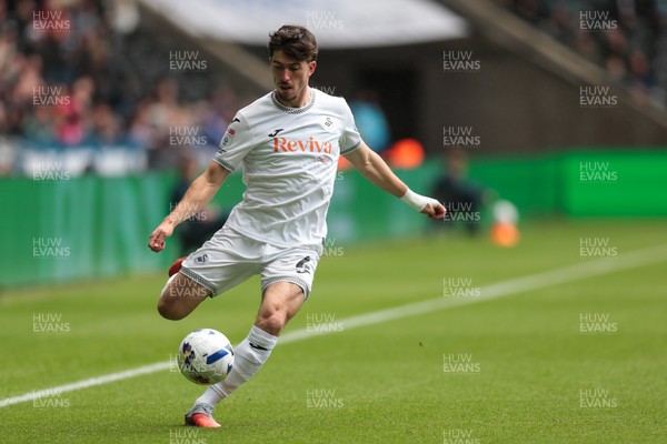 130925 - Swansea City v Hull City - Sky Bet Championship - Josh Key of Swansea City crosses the ball