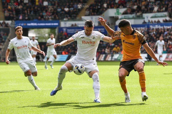 130925 - Swansea City v Hull City - Sky Bet Championship - Zan Vipotnik of Swansea City is put under pressure by John Egan of Hull City