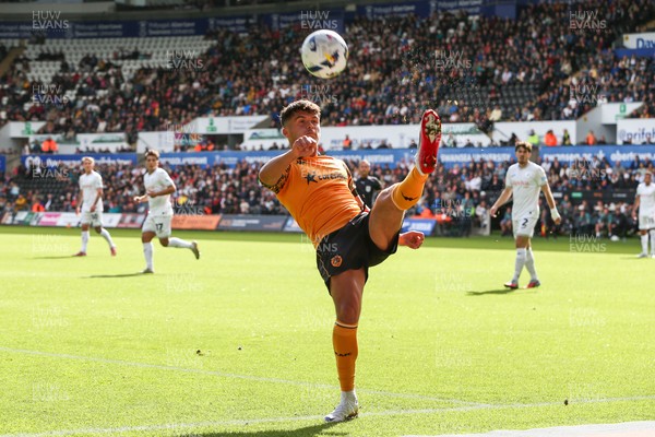 130925 - Swansea City v Hull City - Sky Bet Championship - Ryan Giles clears the ball