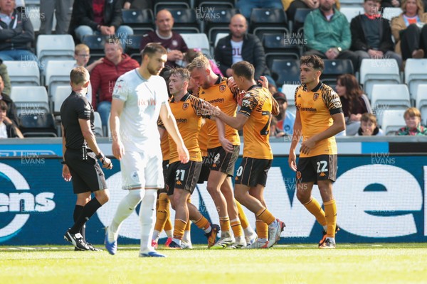 130925 - Swansea City v Hull City - Sky Bet Championship - Oli McBurnie of Hull City celebrates with team mates after scoring a goal