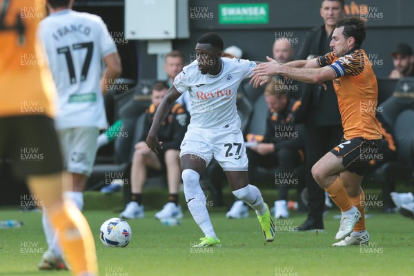 130925 - Swansea City v Hull City - Sky Bet Championship - Zeidane Inoussa of Swansea City  takes on Lewie Coyle of Hull City