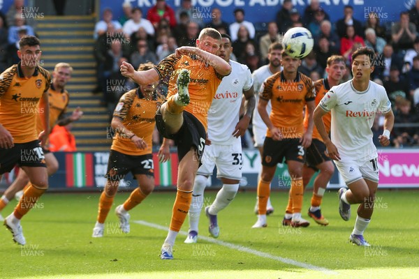 130925 - Swansea City v Hull City - Sky Bet Championship - John Lundstram of Hull City clears