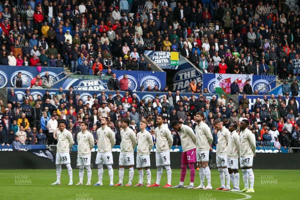 130925 - Swansea City v Hull City - Sky Bet Championship - Swansea City line up for a minute's silence in memory of those who died in the Gleision Colliery accident in 2011