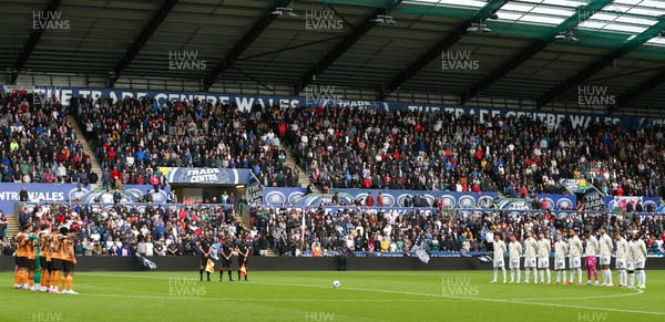 130925 - Swansea City v Hull City - Sky Bet Championship - Teams line up for a minute's silence in memory of those who died in the Gleision Colliery accident in 2011