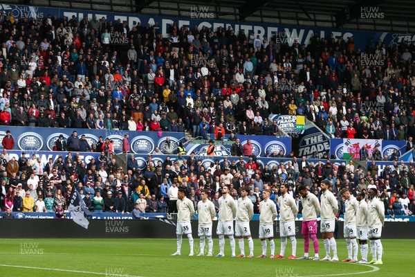 130925 - Swansea City v Hull City - Sky Bet Championship - Swansea City line up for a minute's silence in memory of those who died in the Gleision Colliery accident in 2011