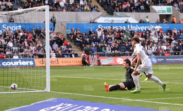 170922 - Swansea City v Hull City, Sky Bet Championship - Luke Cundle of Swansea City scores and celebrates after scoring the second goal
