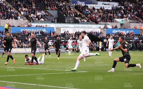170922 - Swansea City v Hull City, Sky Bet Championship - Ryan Manning of Swansea City shoots to score the first goal