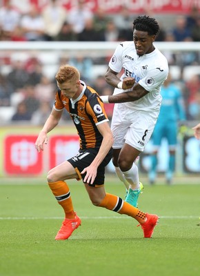 200816 - Swansea City v Hull City, Premier League - Leroy Fer of Swansea City is brought down by Sam Clucas of Hull City