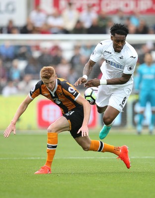 200816 - Swansea City v Hull City, Premier League - Leroy Fer of Swansea City is brought down by Sam Clucas of Hull City