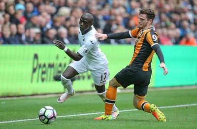 200816 - Swansea City v Hull City, Premier League - Modou Barrow of Swansea City gets past Andrew Robertson of Hull City