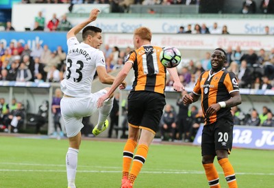 200816 - Swansea City v Hull City, Premier League - Federico Fernandez of Swansea City tries to head at goal