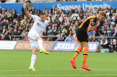 200816 - Swansea City v Hull City, Premier League - Gylfi Sigurdsson of Swansea City fires a shot at goal