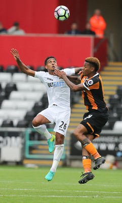 200816 - Swansea City v Hull City, Premier League - Kyle Naughton of Swansea City and Abel Hernandez of Hull City compete for the ball