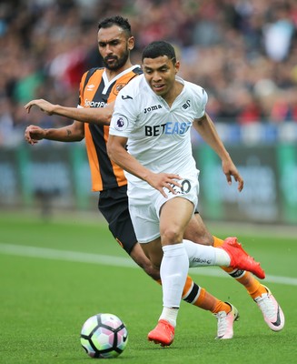 200816 - Swansea City v Hull City, Premier League - Jefferson Montero of Swansea City gets away from Ahmed Elmohamady of Hull City