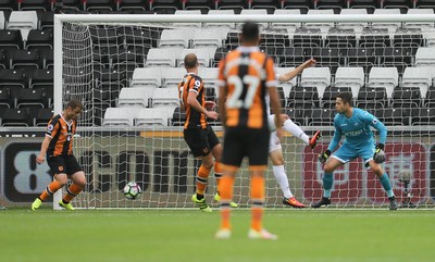 200816 - Swansea City v Hull City, Premier League - Shaun Maloney of Hull City, left, scores goal