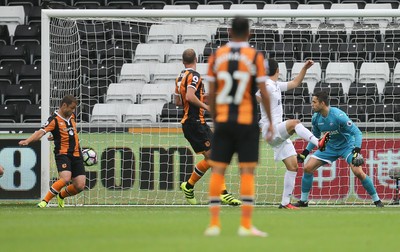 200816 - Swansea City v Hull City, Premier League - Shaun Maloney of Hull City, left, scores goal