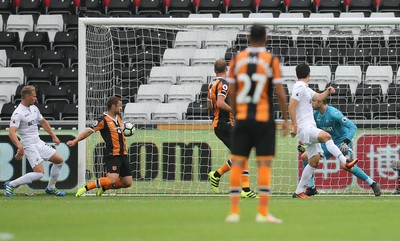 200816 - Swansea City v Hull City, Premier League - Shaun Maloney of Hull City, left, scores goal