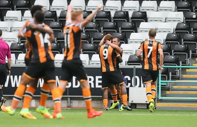 200816 - Swansea City v Hull City, Premier League - Hull City players celebrate after scoring the second goal