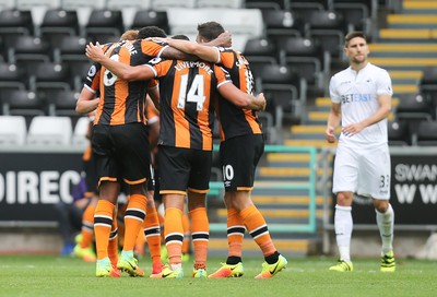 200816 - Swansea City v Hull City, Premier League - Hull City players celebrate after scoring the second goal