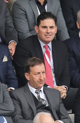 200816 - Swansea City v Hull City, Premier League - Jason Levien, centre, red tie, one of the members of the American consortium who bough the major share in Swansea City, sat behind Chairman Huw Jenkins