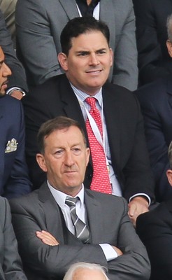 200816 - Swansea City v Hull City, Premier League - Jason Levien, centre, red tie, one of the members of the American consortium who bough the major share in Swansea City, sat behind Chairman Huw Jenkins