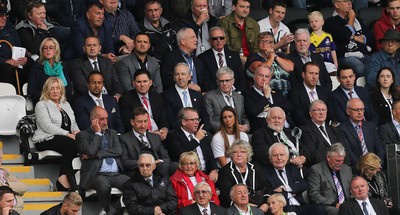 200816 - Swansea City v Hull City, Premier League - The Directors box at the Swansea City Stadium, with Chairman Huw Jenkins, second row, second left, and Jason Levien, third row, third left, red tie