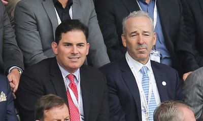 200816 - Swansea City v Hull City, Premier League - Jason Levien, left, and Stephen Kaplan who headed up the American consortium who bought the major share in Swansea City watch the match, sat behind Chairman Huw Jenkins