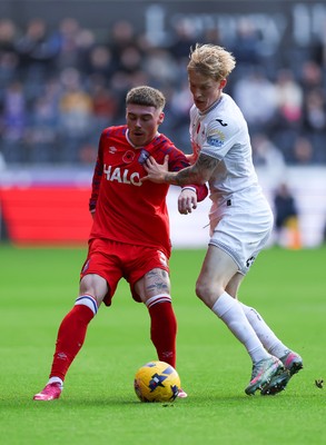 081125 - Swansea City v Ipswich Town, EFL Sky Bet Championship - Leif Davis of Ipswich and Melker Widell of Swansea City compete for the ball