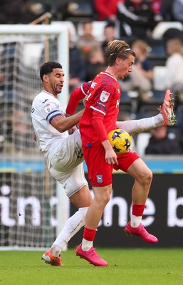 081125 - Swansea City v Ipswich Town, EFL Sky Bet Championship - Ben Cabango of Swansea City and Jack Clarke of Ipswich compete for the ball