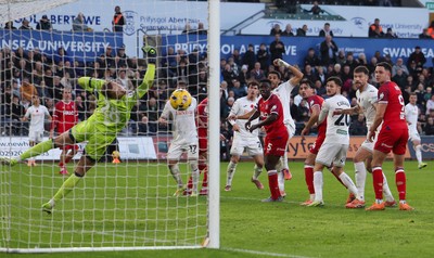 081125 - Swansea City v Ipswich Town, EFL Sky Bet Championship - Ipswich goalkeeper reacts to save fa header from Ben Cabango of Swansea City